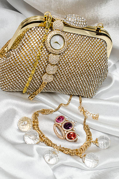 set of women's accessories on a silk background