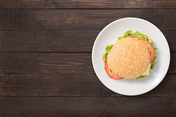 istock Top view BBQ burger on white dish on wooden background. 610446250