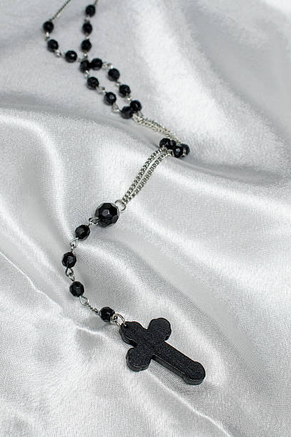 istock Cross church on a silk background 610447404