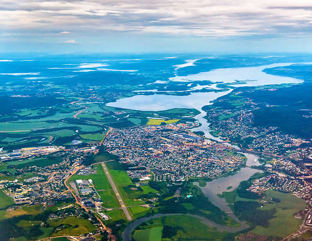 View of Lillestrom town from an airplane on the approach View of Lillestrom town from an airplane on the approach to Gardermoen Airport - Norway wow airlines stock pictures, royalty-free photos & images