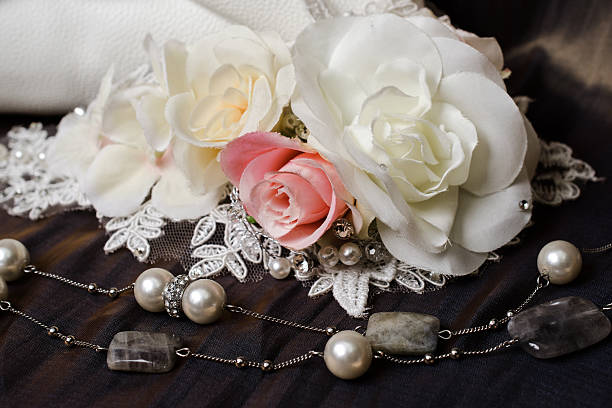 istock Roses with  pearl necklaces 610450166