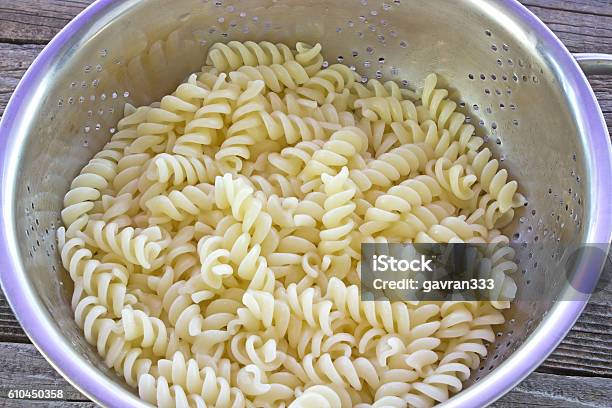 Fresh Cooked Fusilli Pasta In Strainer On Table Stock Photo - Download Image Now - Cereal Plant, Close-up, Colander