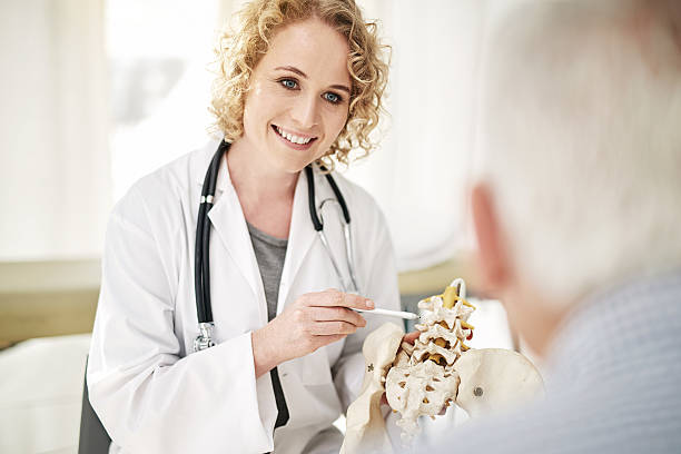 istock Giving her patient a hands on diagnosis 610451206