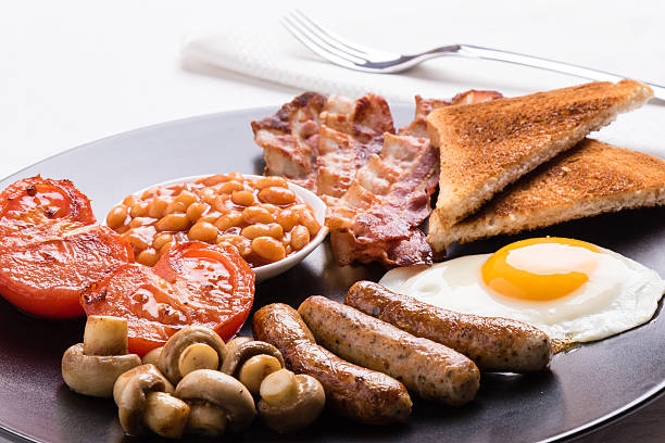 istock full english breakfast on black plate 610451242