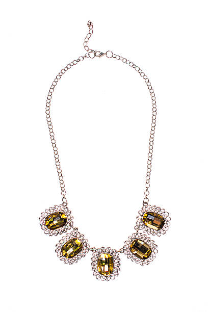 istock Silver necklace with sapphire on a white background 610452202