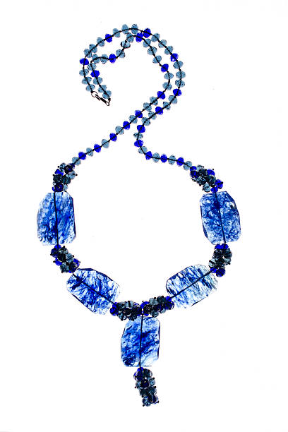 istock necklace with blue beads on a white background 610452436