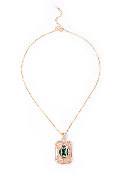 istock gold pendant with stone on a white background 610452860