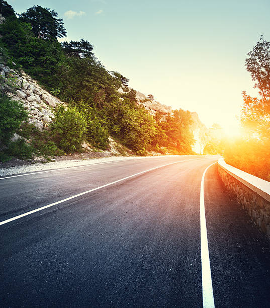 istock Asphalt road with instagram toning. Landscape with mountain road 610454028