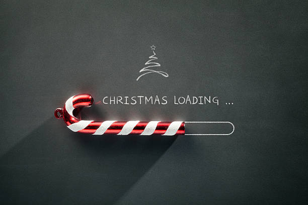 istock Blackboard Holiday Decoration - Christmas loading Candy Cane 610454462