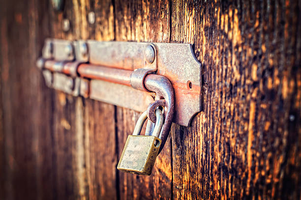 istock Old latch of a main door 610455012