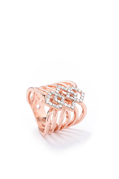 istock gold ring with an ornament on a white background 610539660
