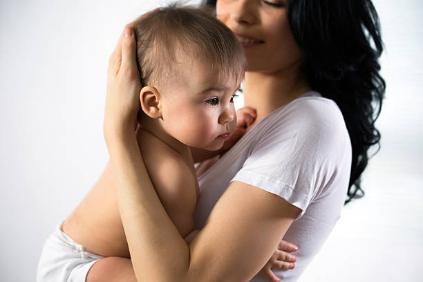 istock Mother with baby 610539814
