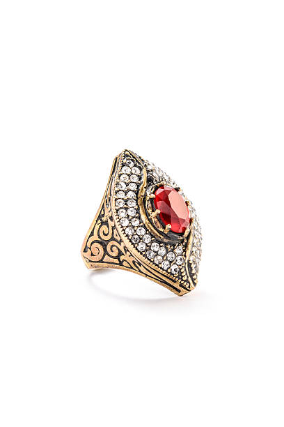 istock gold ring with rubinoma on white background 610539890