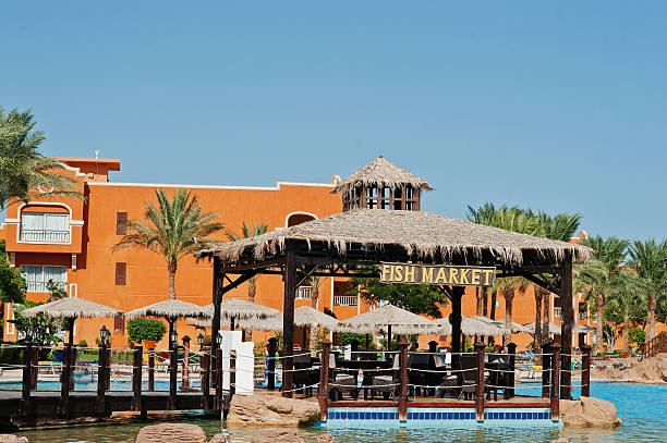 istock Fish market on pool at resort on sunny day 610540420