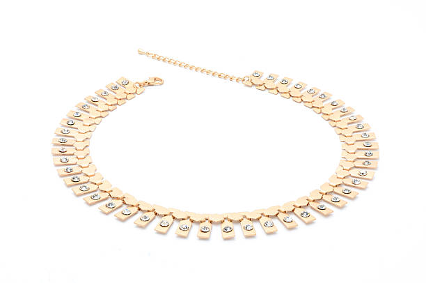 istock gold necklace isolated on white 610541528