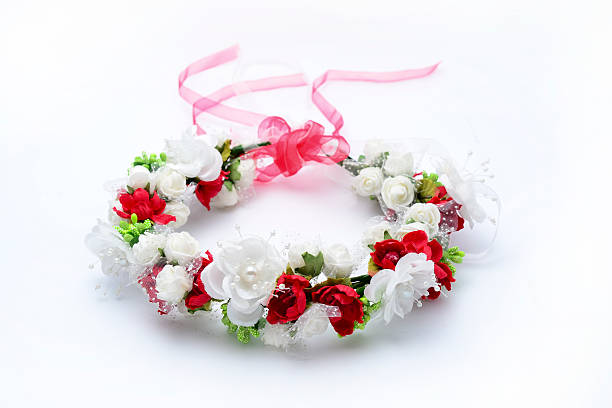 istock wreath with colored flowers isolated on white 610542226