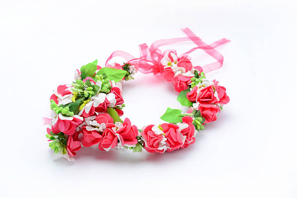 istock wreath with red roses isolated on white 610542378