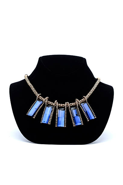 istock Necklace with blue gems on a mannequin 610543810
