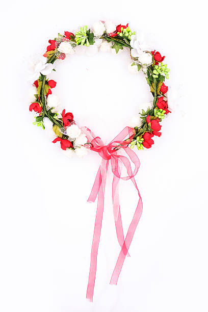 istock wreath with colored flowers isolated on white 610544794