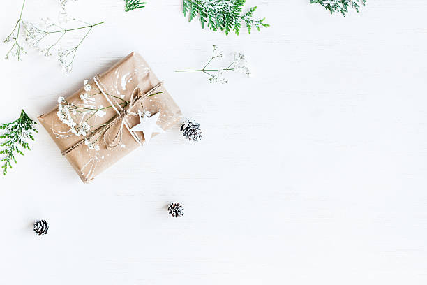 istock Christmas gift, pine cones, thuja branches and gypsophila flowers 610547128