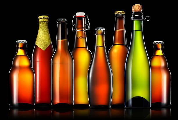 istock Set of beer bottles isolated on black background 610547656