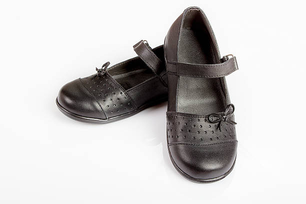 4,100+ Black School Shoes Stock Photos, Pictures & Royalty-Free Images ...