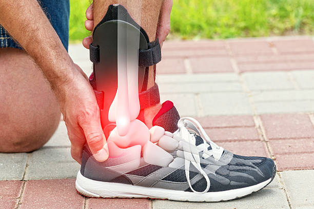 istock Man wearing ankle brace 610550688