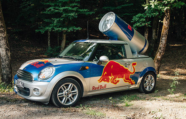 Red Bull Car Istanbul, Turkey- May 25, 2014: Red Bull mini cooper publicity car with a can of red bull drink in Parkorman, İstanbul. Red Bull is an energy drink sold by Austrian company Red Bull  red bull mini stock pictures, royalty-free photos & images