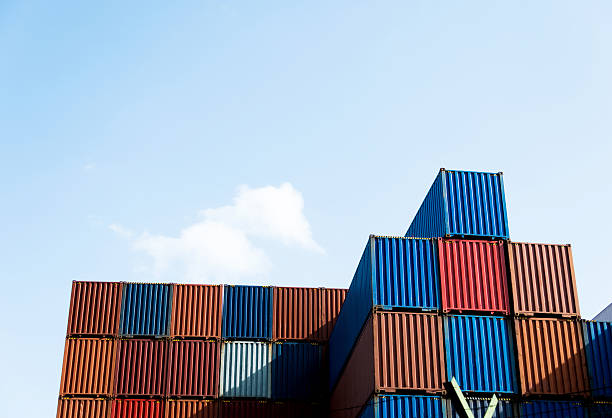 Free Stock Photo of A group of metal shipping containers with white ...