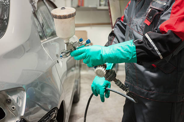 istock painting a car 610553074