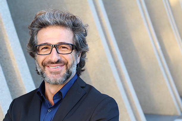 istock Portrait of an elegant CEO smiling 610555612
