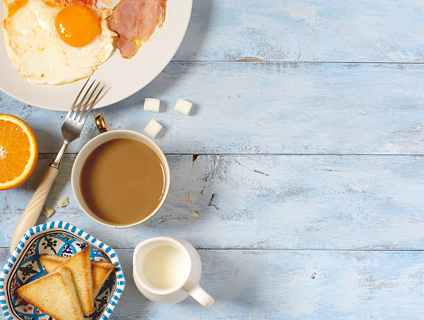 istock Background breakfast fried eggs, coffee and toast 610555840