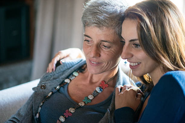 istock Mother and daughter reading together 610556076