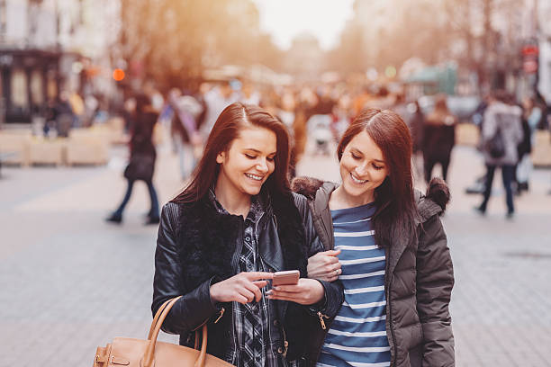istock Friends sharing information on smartphone 610556684