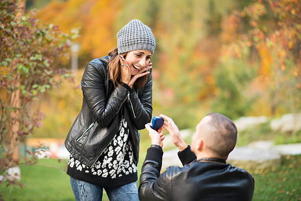 istock Autumn outdoor wedding proposal engagement 610556686