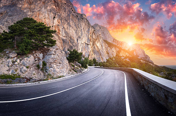 istock Asphalt road. Colorful landscape with beautiful winding mountain 610557996