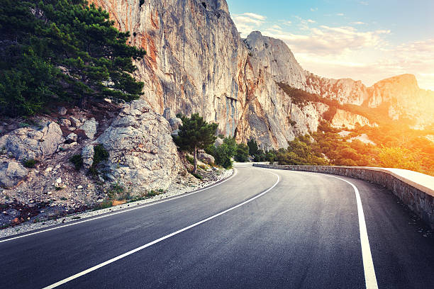 istock Asphalt road. Colorful landscape with beautiful winding mountain 610558172
