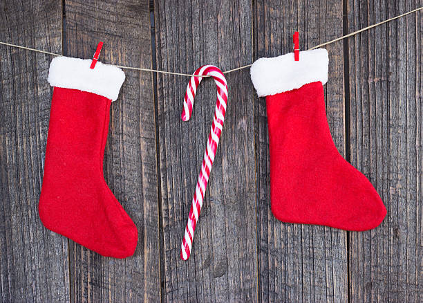 istock frames and christmas decor on rope over rustic wooden board 610558962