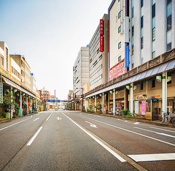 istock Nagaoka japan empty street view back lit square frame 610559520