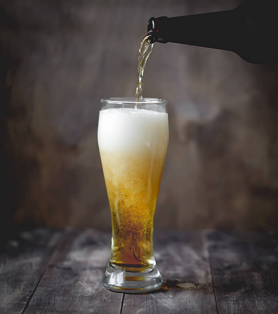 istock Beer in glass and bottle 610559774