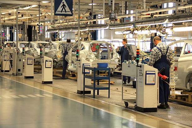 Tychy, Poland - June, 16th, 2011: Cars production line in Fiat factory in Poland. The Assembly Plant ensures both the production of the Fiat range models (500), Lancia/Chrysler Ypsilon and Ford Ka. The manufacturing line was adapted for an annual capacity of 600,000 cars.
