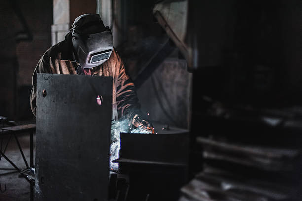 istock large concrete products plant and welding on it. 610560706