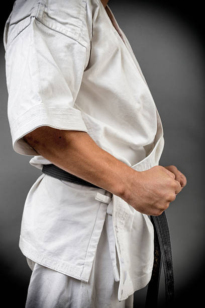 istock Young man in white kimono 610561100