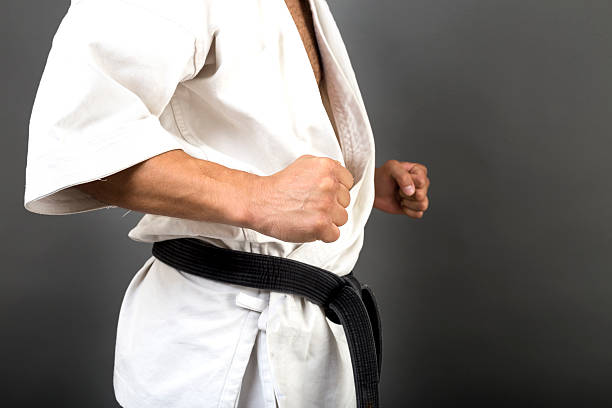 istock Young man in white kimono 610561140