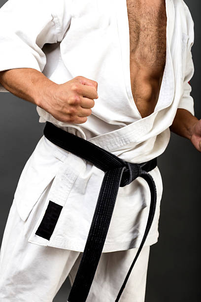 istock Young man in white kimono 610561186