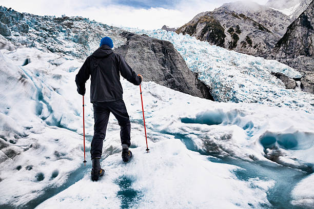 ледник пешие прогулки по леднику франца-иосифа в новой зеландии - franz josef glacier стоковые фото и изображения