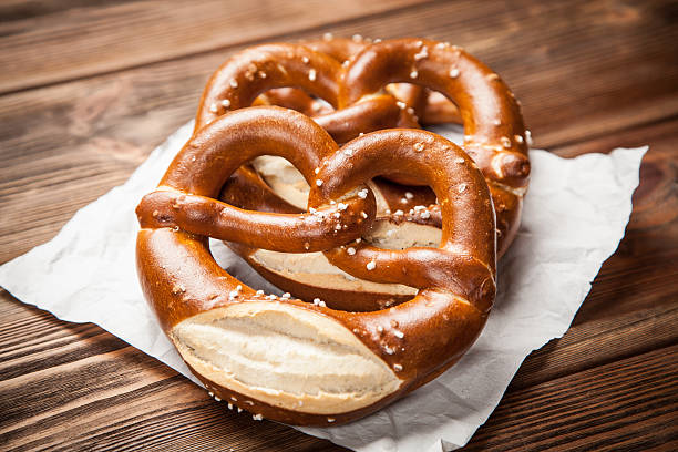 istock Pretzels on wooden table 610564586