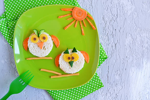 istock Breakfast for children, sandwich with cheese and carrot 610566488