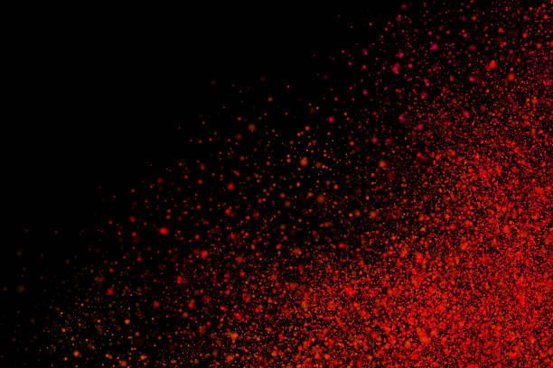 Colourful abstract powder explosion on a black background stock photo