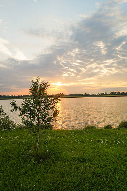 istock Beautiful sunset on the river orange sky 610572536